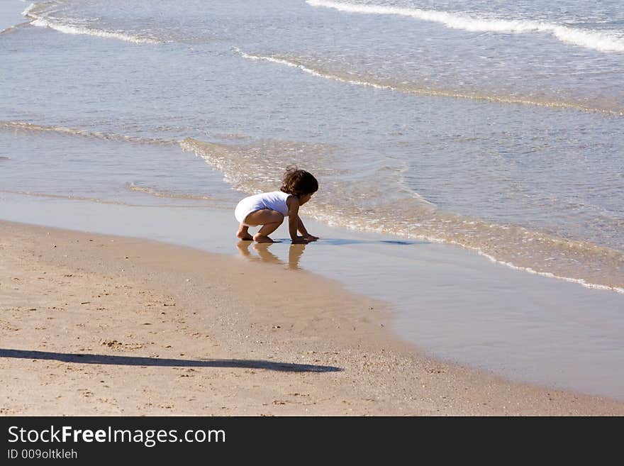 Little girl on the beach.