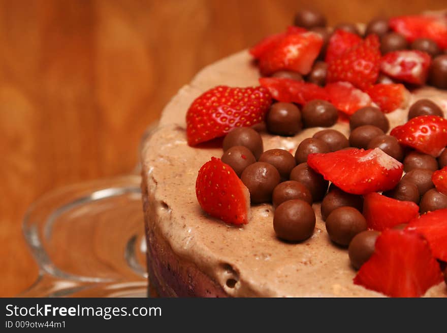 Strawberry icecake on a cakeplatter cropped shot. Strawberry icecake on a cakeplatter cropped shot