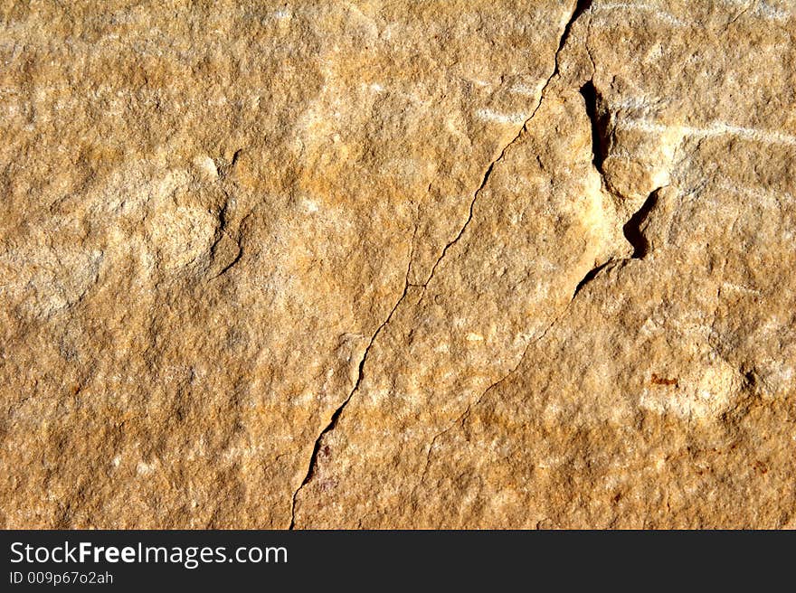 Reddish face of stone - different structures - landscape format