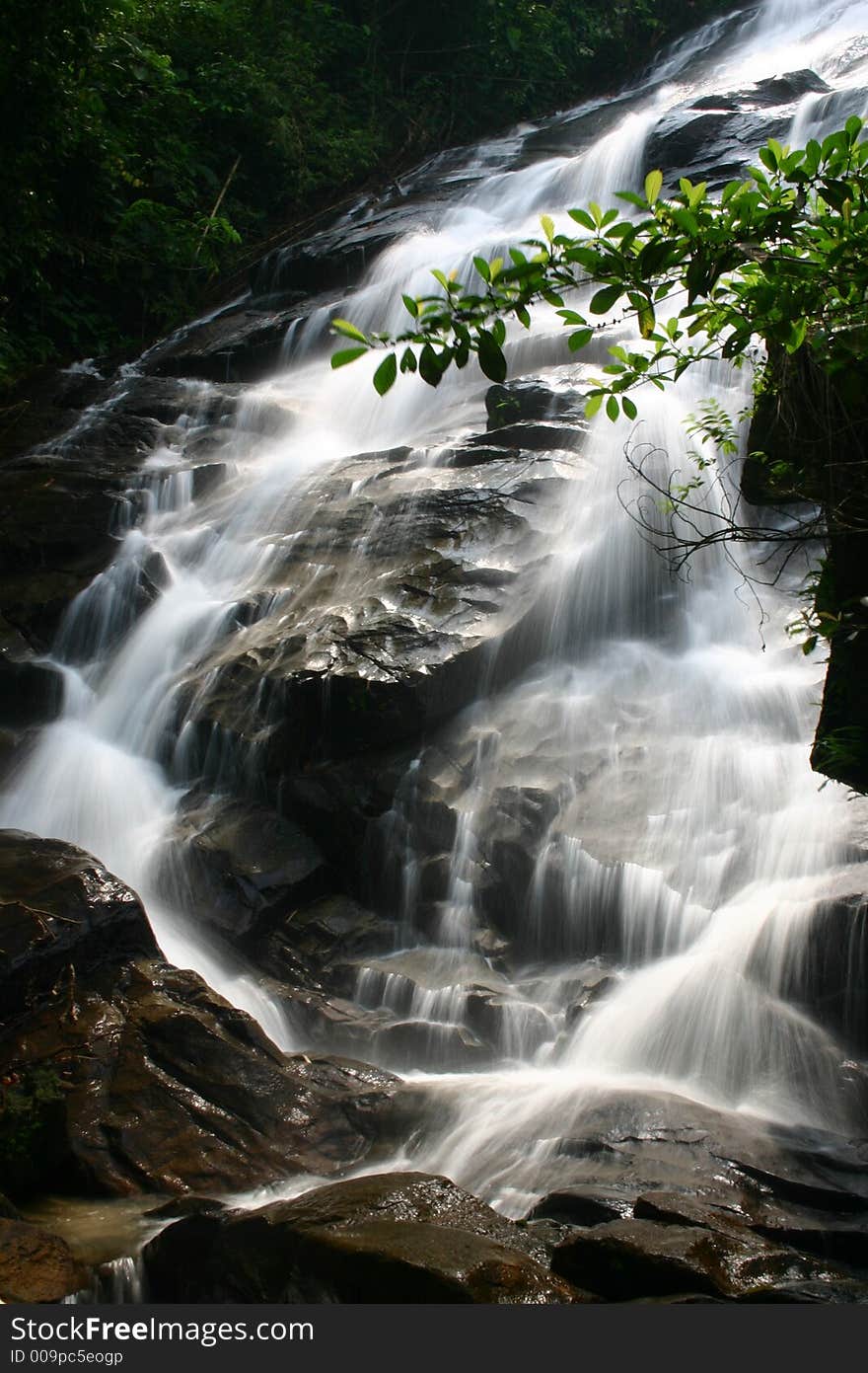 A scenic waterfall stream in silky effect.