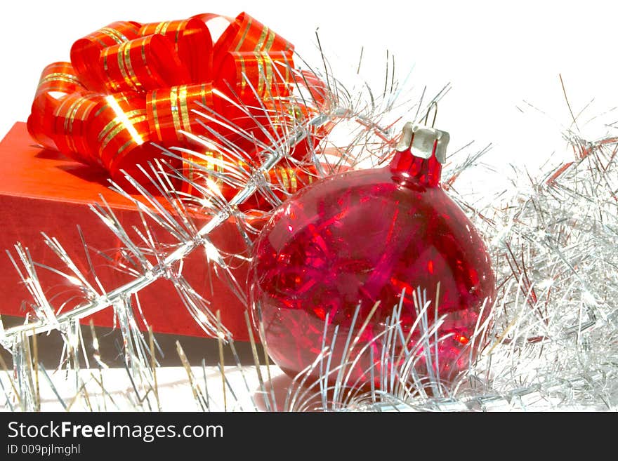 Gift box, xmas ball and tinsel