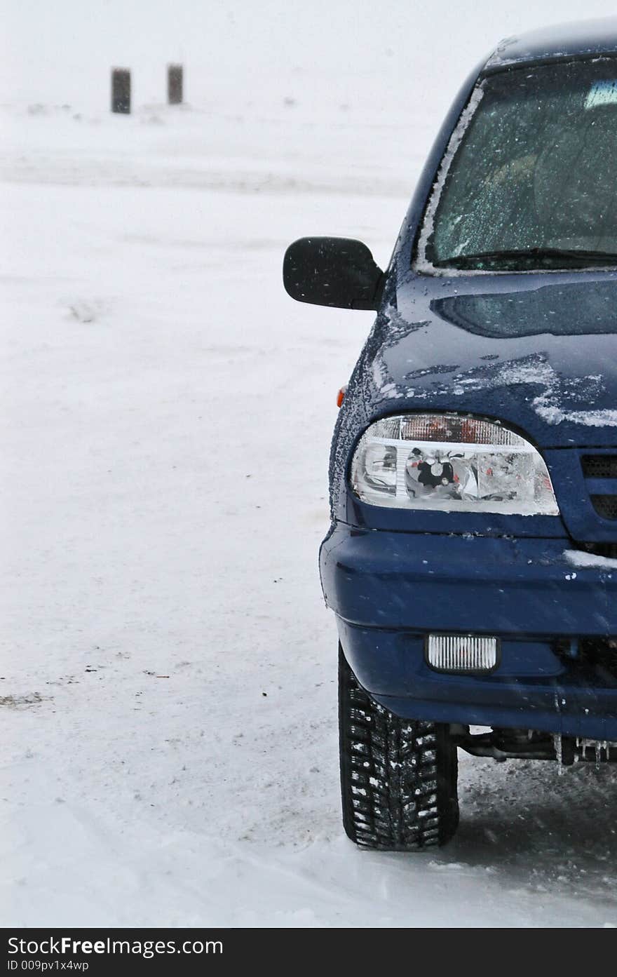 Using an SUV in Winter conditions. Windy weather not far from northern polar circle. Using an SUV in Winter conditions. Windy weather not far from northern polar circle.