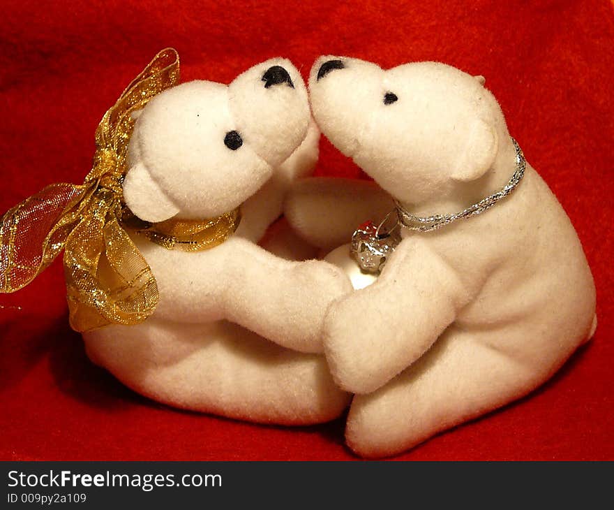 Couple toy white bears kissing in Christmas decoration. Couple toy white bears kissing in Christmas decoration