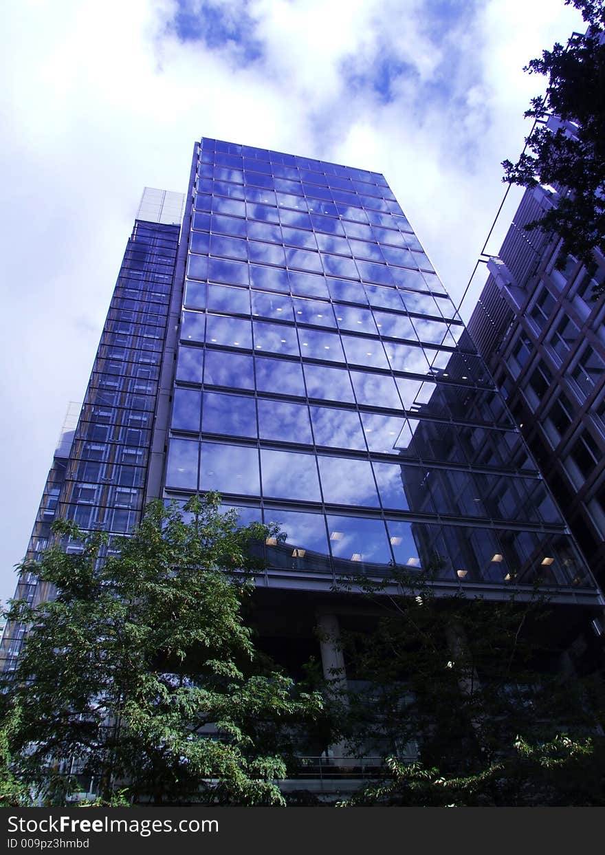 A modern glass office building in central London. A modern glass office building in central London.