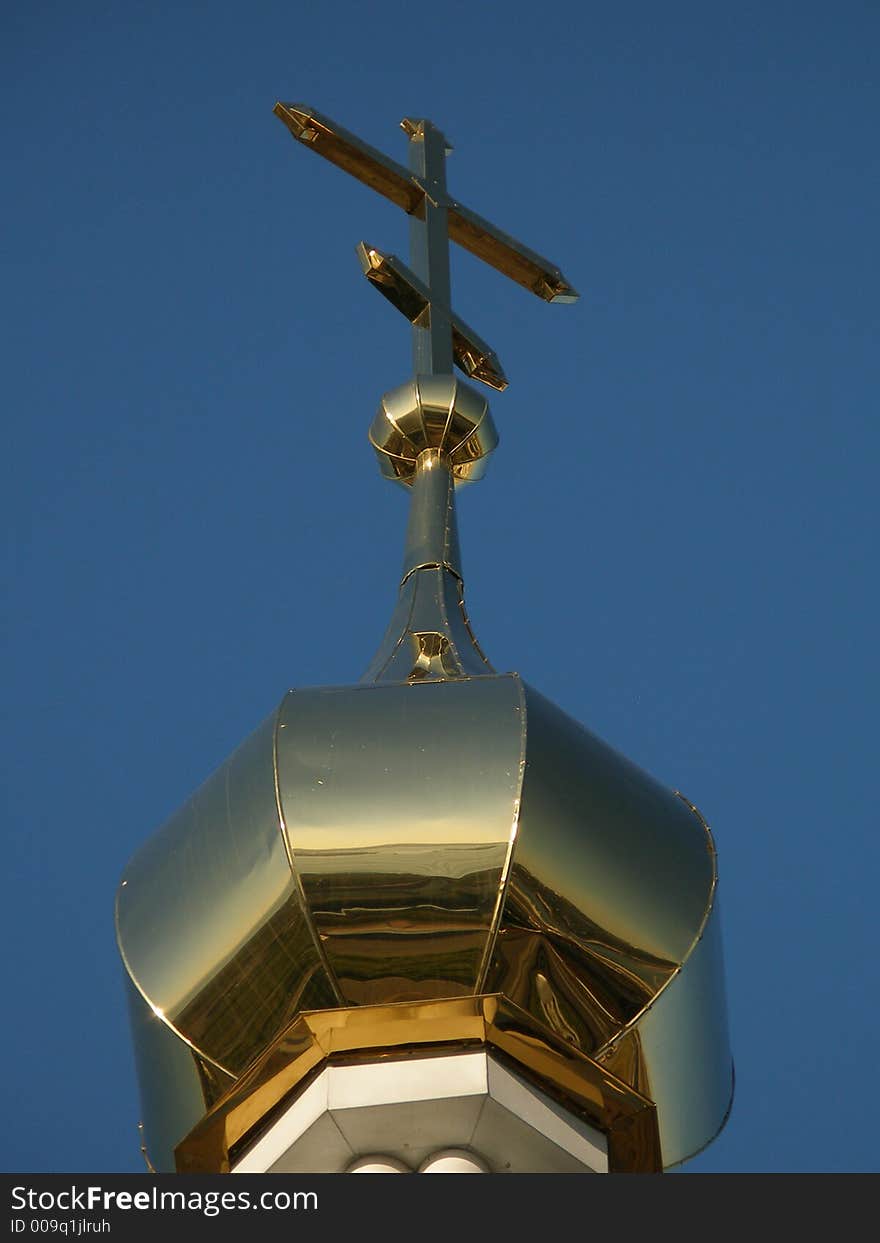 The golden dome of the Church, cross, orthodoxy, Russia. The golden dome of the Church, cross, orthodoxy, Russia