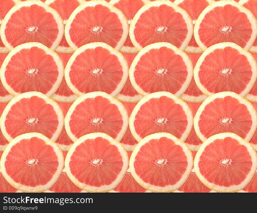 Fresh ruby red grapefruit as a background