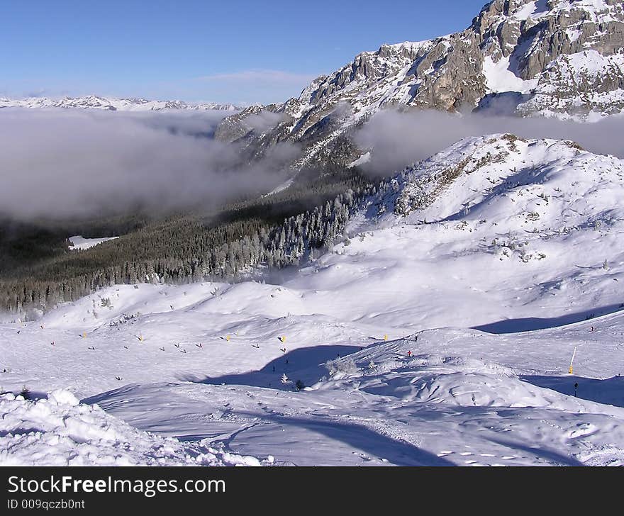 A white cover of snow in the mountains. A white cover of snow in the mountains