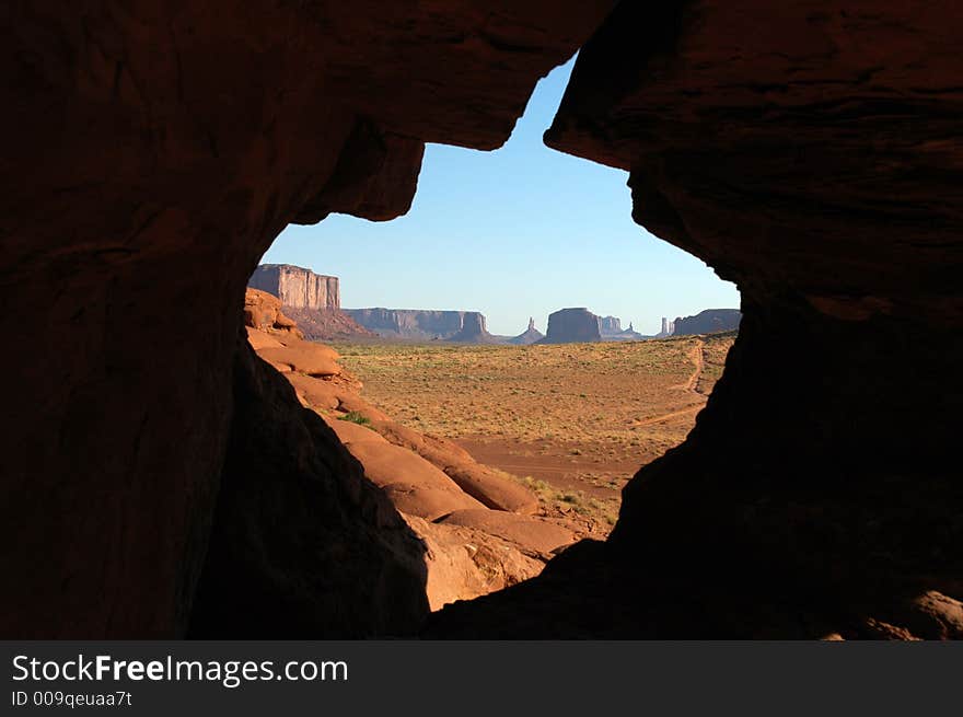 View of the Monument Valley though a leaf-shape window. Monument Valley Navajo tribal park, Arizona/Utah