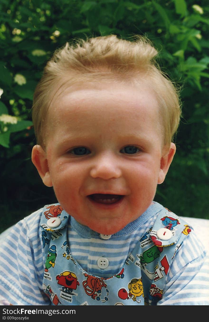 One year old boy smiling