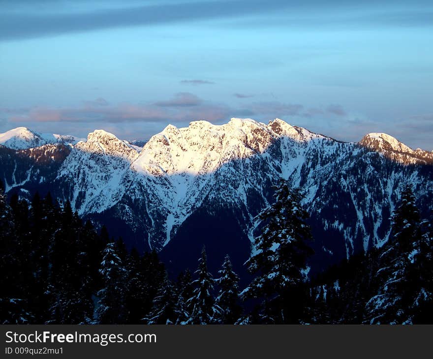 Sunny snowy peak