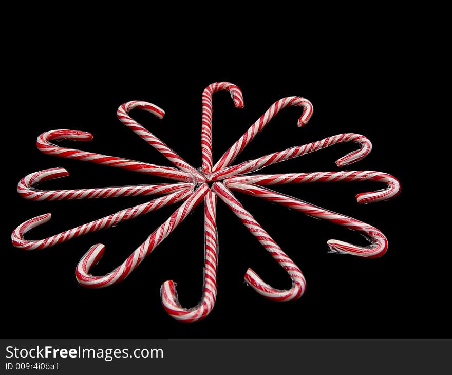 Candy cane spiral on a black background. Candy cane spiral on a black background.