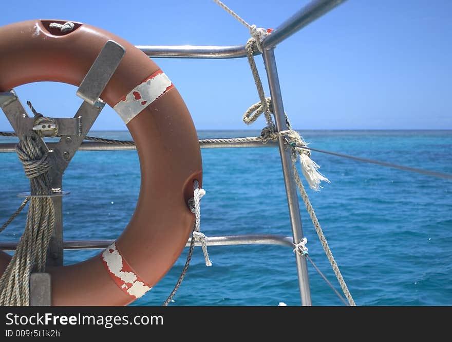 Life ring on boat on sunny day