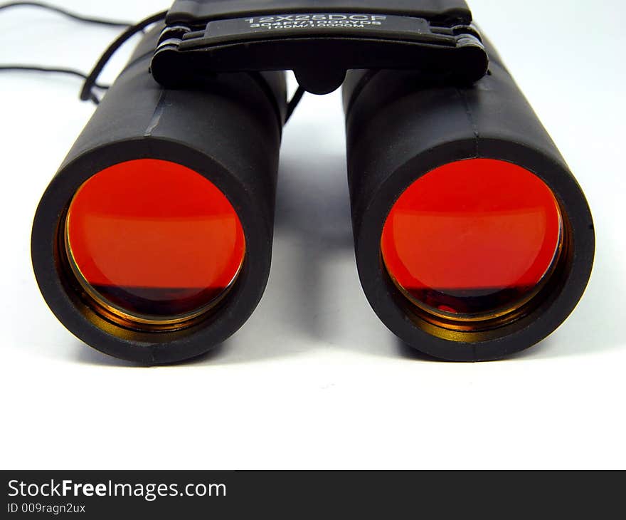 Black binoculars isolated on white.