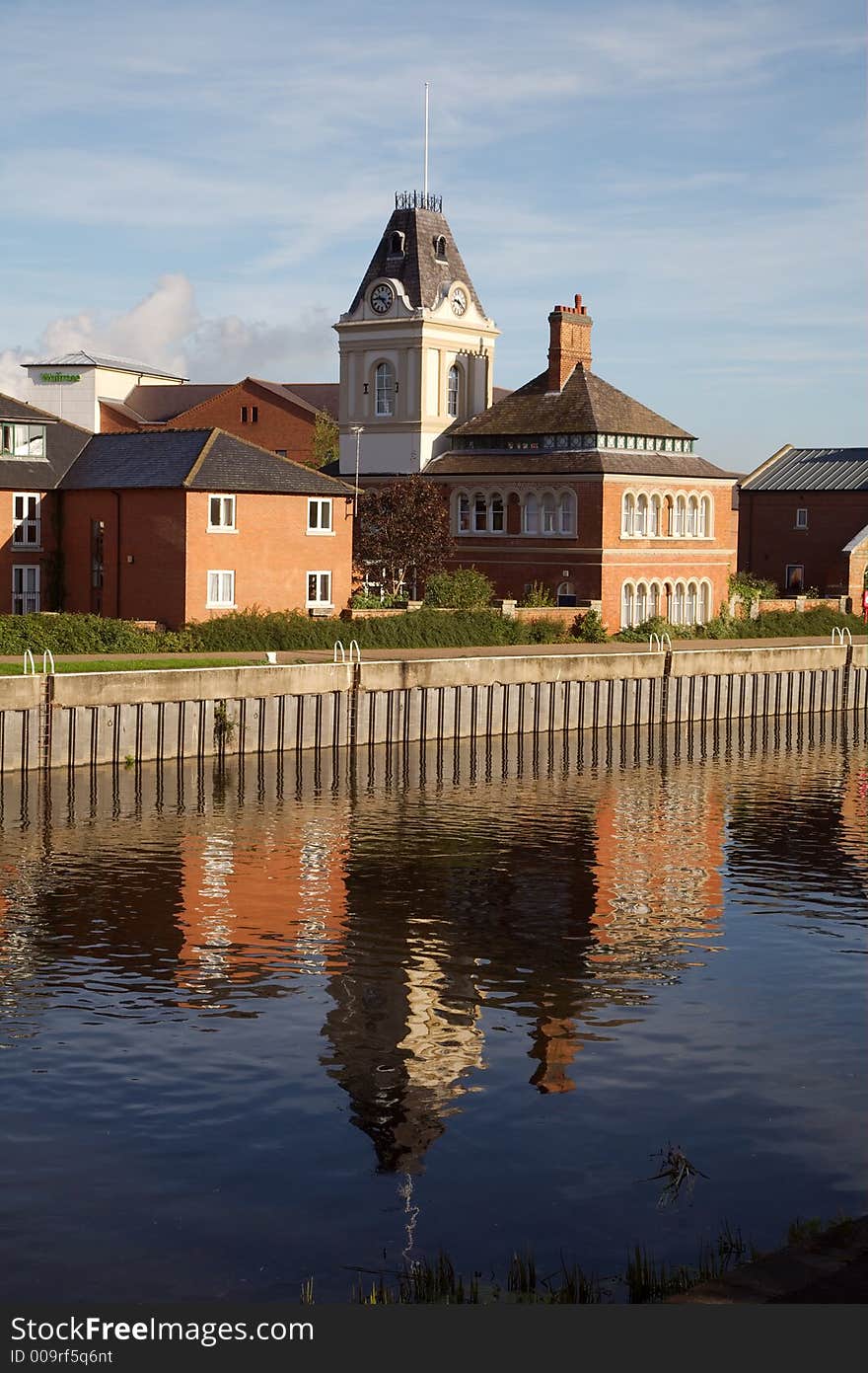 A clock tower reflection in the River Trent at Newark.