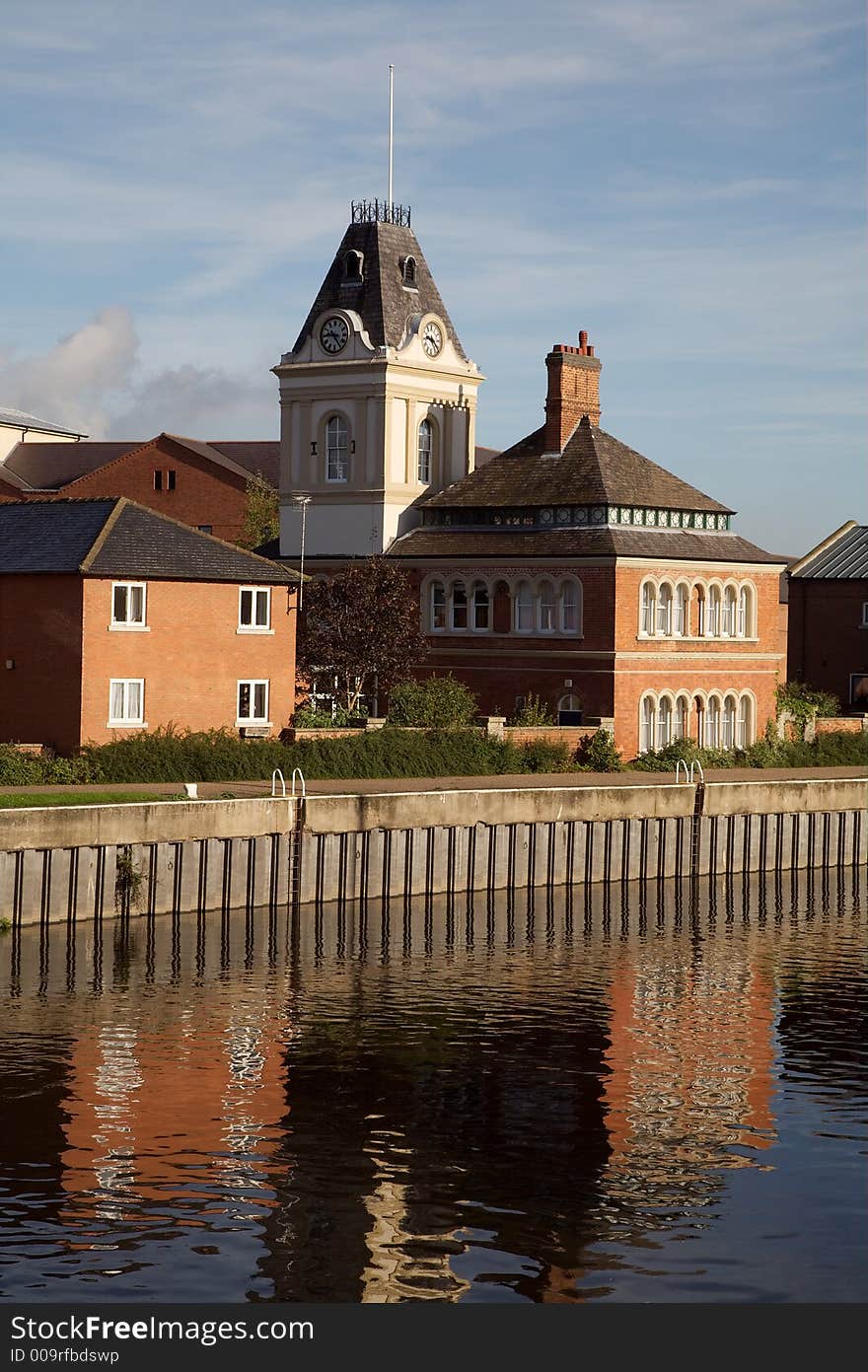 A clock tower reflection in the River Trent at Newark.