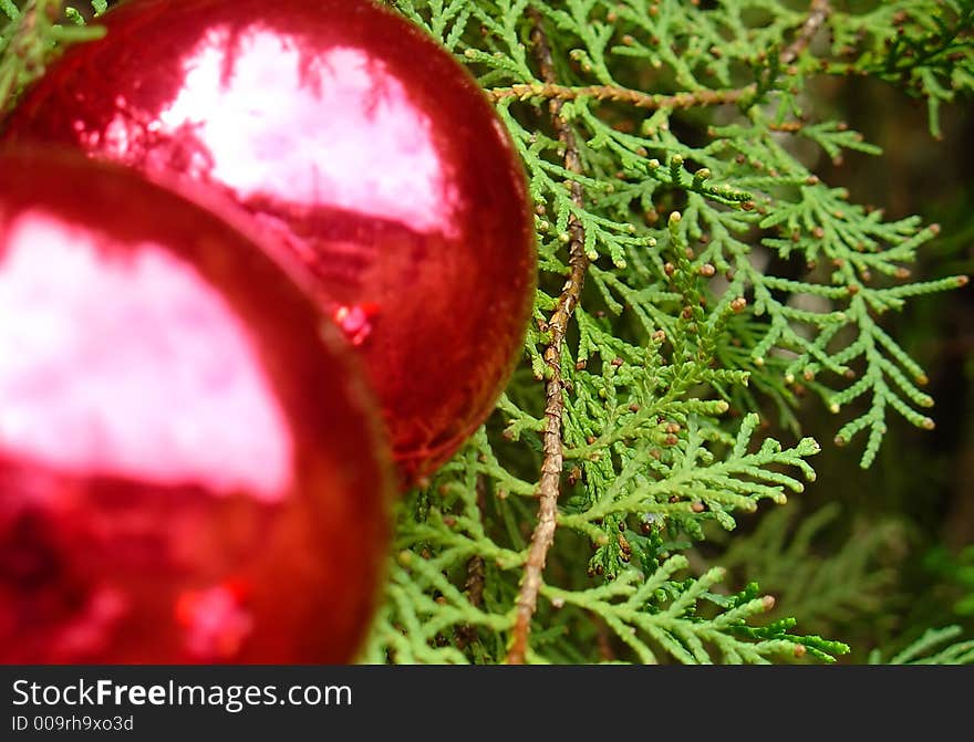 Christmas tree balls with Santa Claus reflected by the light