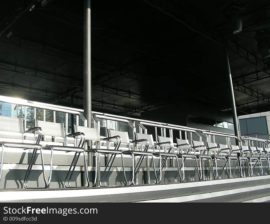 Empty seats in the audience area at an outdoor. Empty seats in the audience area at an outdoor