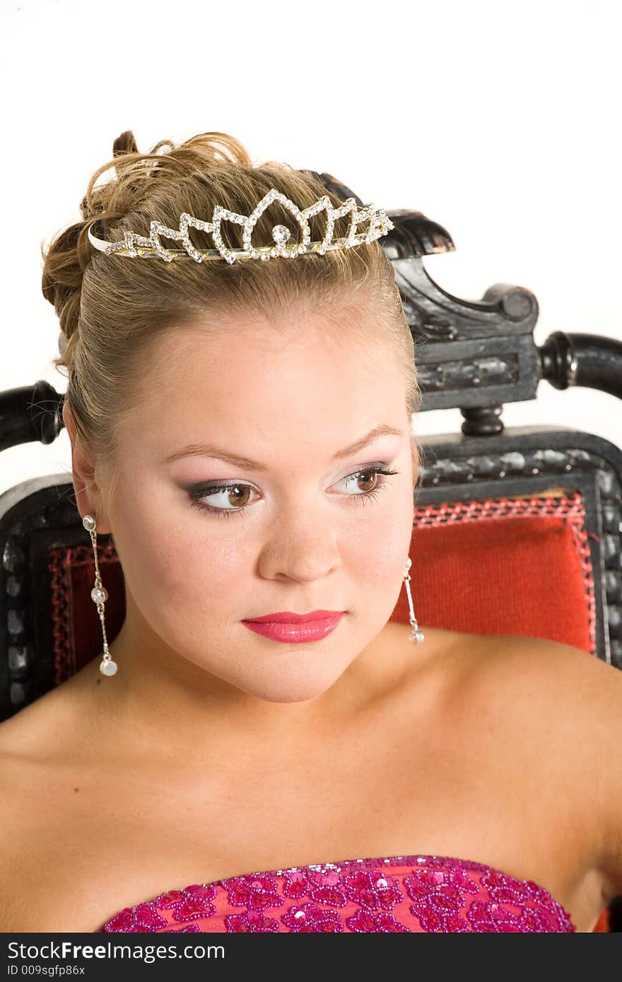 Portrait of a teenager wearing the tiara of Miss Gymnasium.