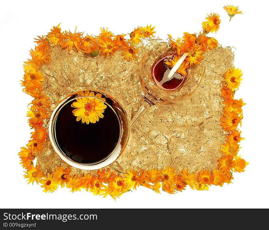 Glass of wine spangled with yellow flowers. Glass of wine spangled with yellow flowers