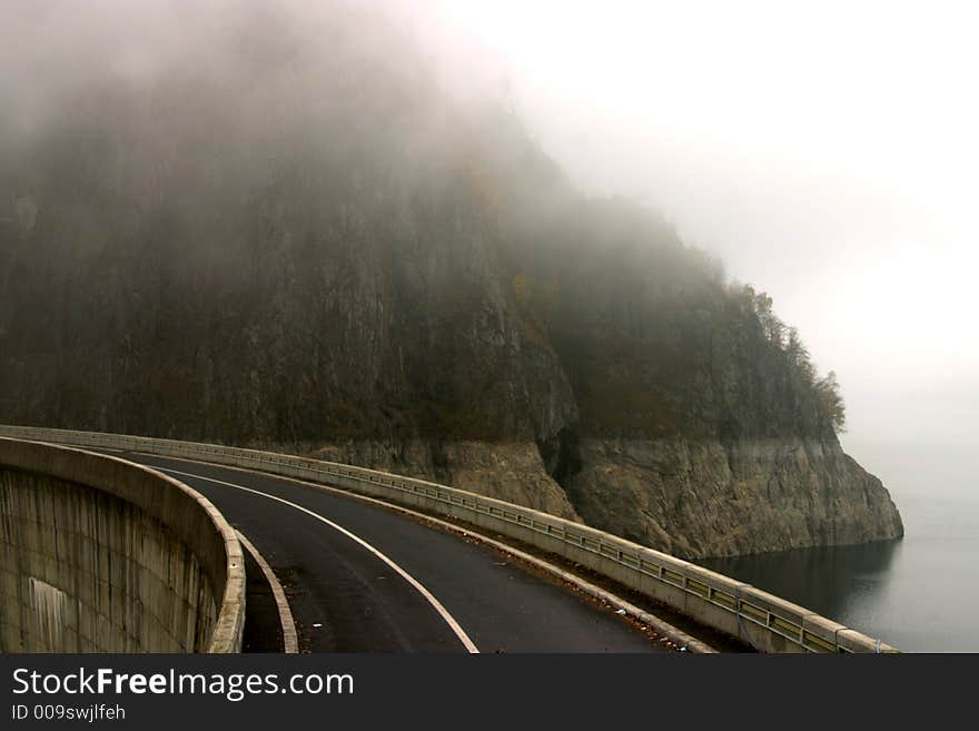 Mist road over Vidraru Dam - Romania, 166 m hight, 465 millions mc, build in 1966