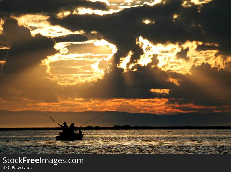 Fishing on sundown on Baikal. Fishing on sundown on Baikal