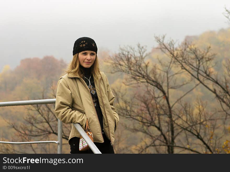 Lonely beautiful women waiting in mist