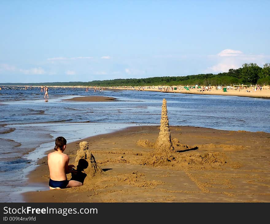 Boy playing on a beach