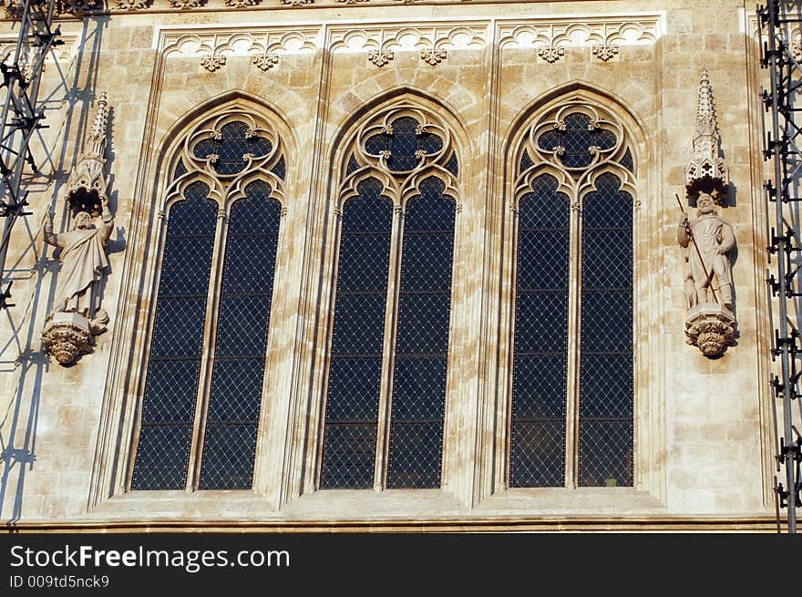 Ancient ornamental church windows on the sun