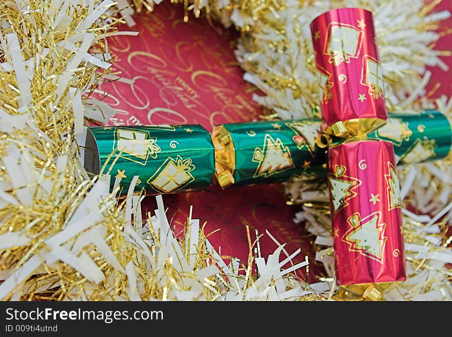 Red & green christmas crackers - shallow depth of field. Red & green christmas crackers - shallow depth of field