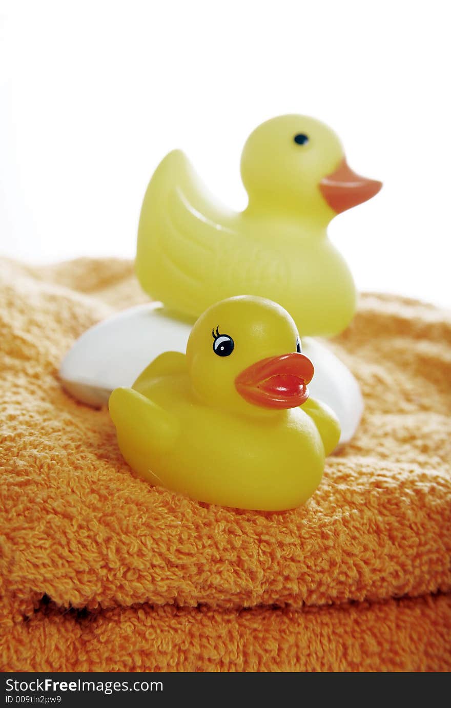 Yellow rubber duckies and a bar of soap