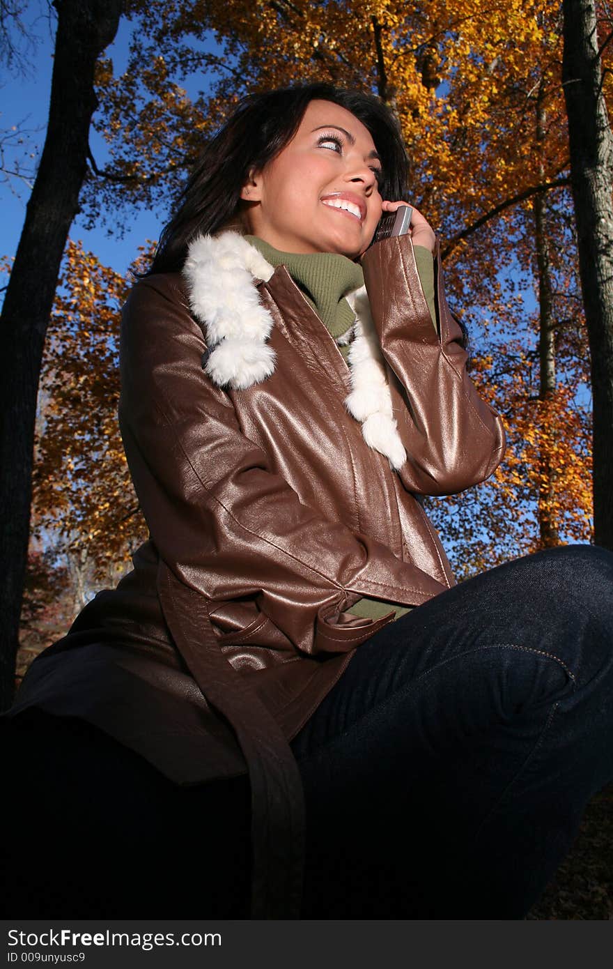 Autumn Scene Fall Woman With Cell Phone
Communications Scene With Eye Appealing Model