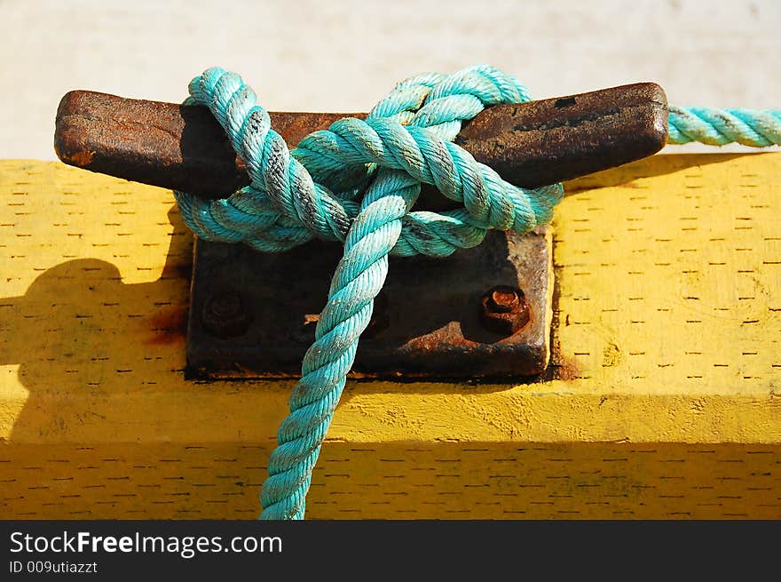 Rope connected from a boat that is tied down