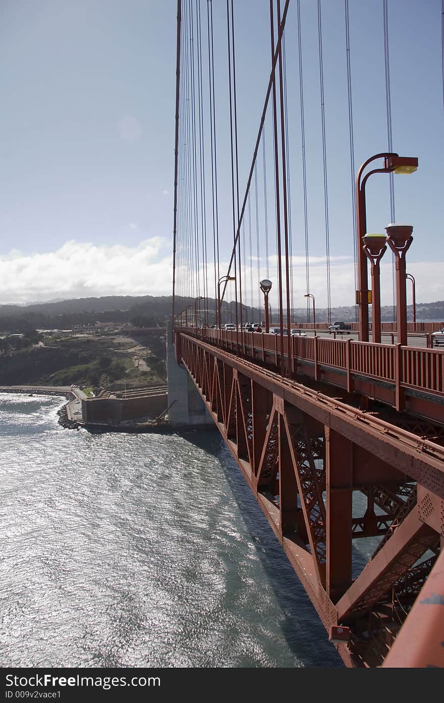 Part of the Golden Gate Bridge with San Francisco in background