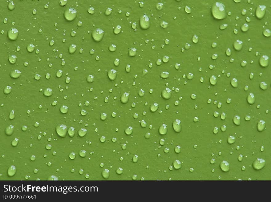 Drops on the green background. Drops on the green background