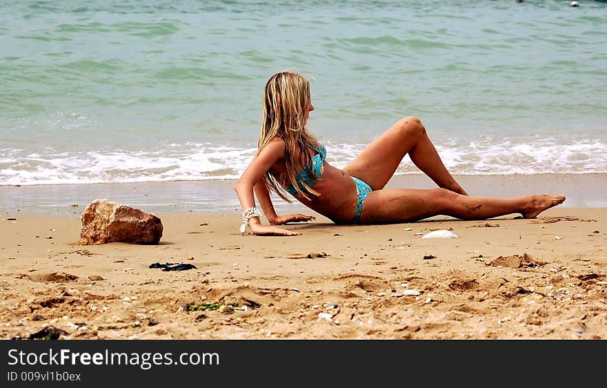 Girl on the sea beach