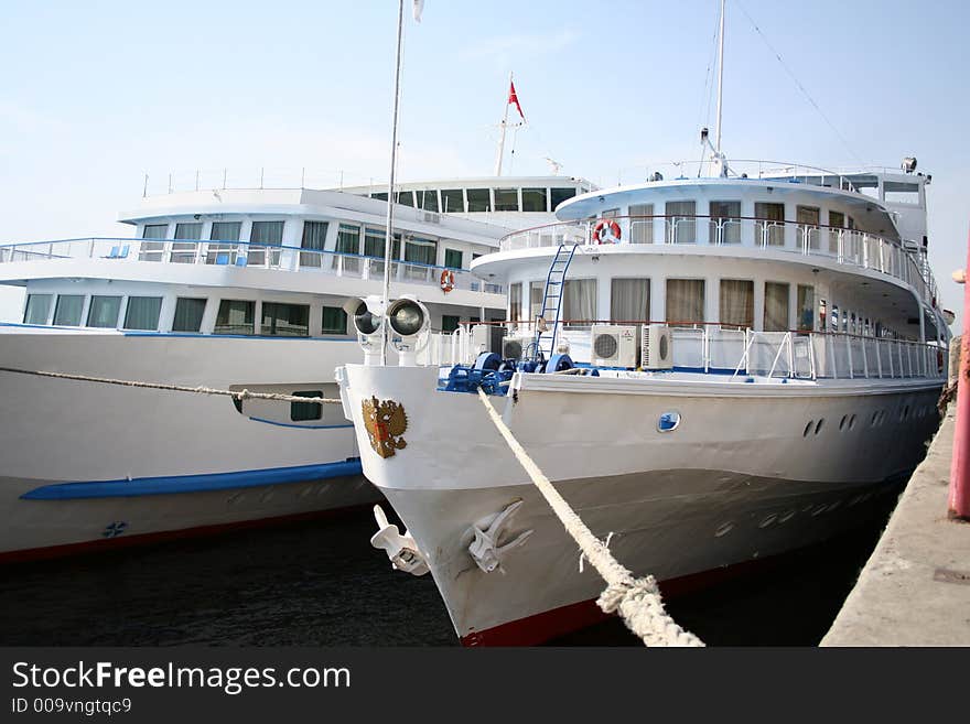 Two passenger motorships docked to wharf, (look similar images in my portfolio)