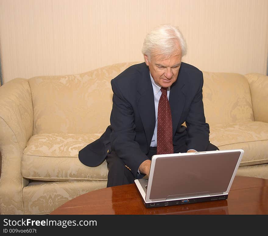 Senior Businessman on a Laptop Computer. Senior Businessman on a Laptop Computer