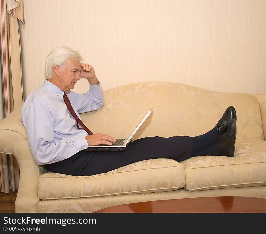 Senior Businessman on a Laptop Computer. Senior Businessman on a Laptop Computer