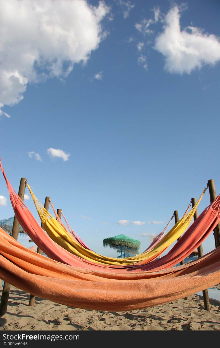 Colorful hammocks on a beach