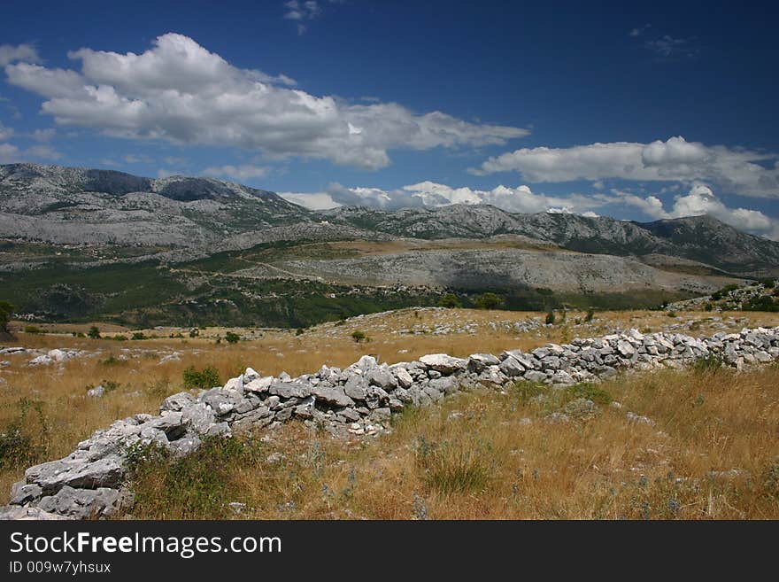 Mountains with blue sky and clouds