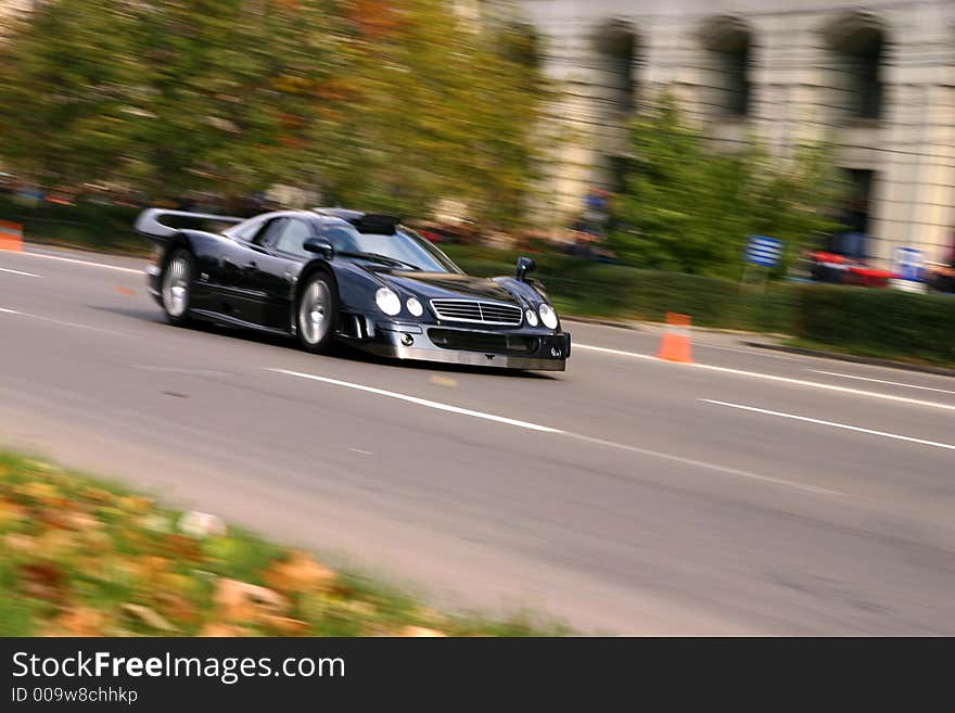 Shiny black power race car. Shiny black power race car