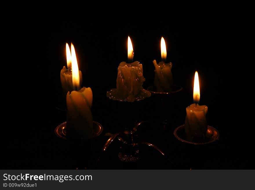 Light of five candles in darkness. Light of five candles in darkness