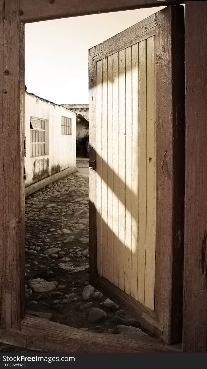 An old rural door with washed out colors. An old rural door with washed out colors