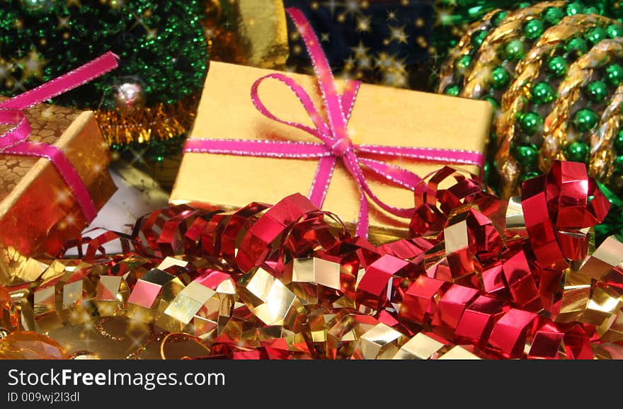 Christmas Gift with Ornaments and Ribbon, Shallow DOF. Christmas Gift with Ornaments and Ribbon, Shallow DOF