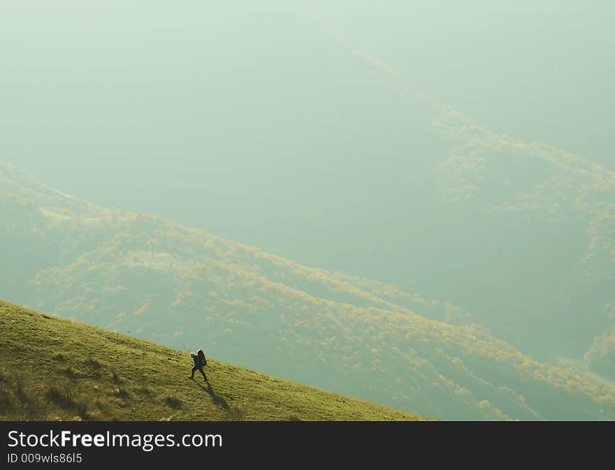 Hiker Going Up On Hill