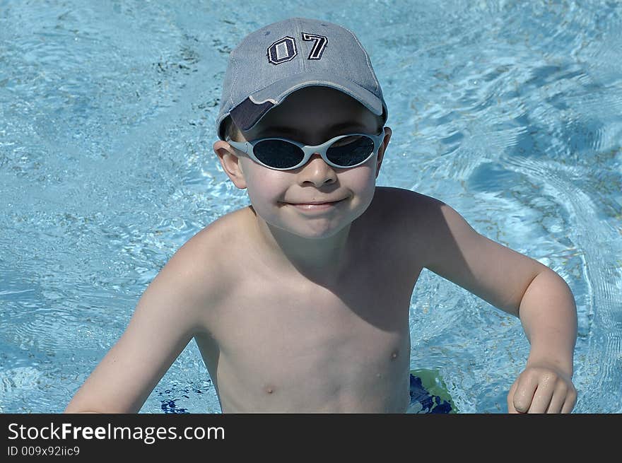 A boy in a swimming pool. A boy in a swimming pool