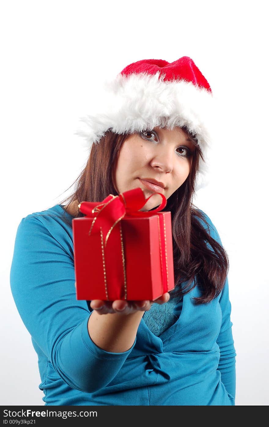 Attractive woman with santa claus hat and gift on white background. Attractive woman with santa claus hat and gift on white background