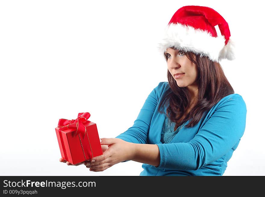 Attractive woman with santa claus hat and gift on white background. Attractive woman with santa claus hat and gift on white background