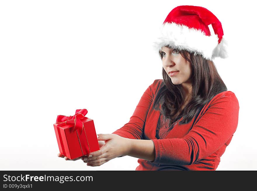 Attractive woman with santa claus hat and gift on white background. Attractive woman with santa claus hat and gift on white background