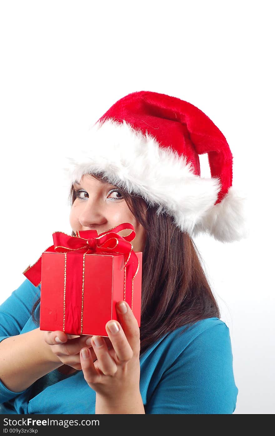 Attractive woman with santa claus hat and gift on white background. Attractive woman with santa claus hat and gift on white background